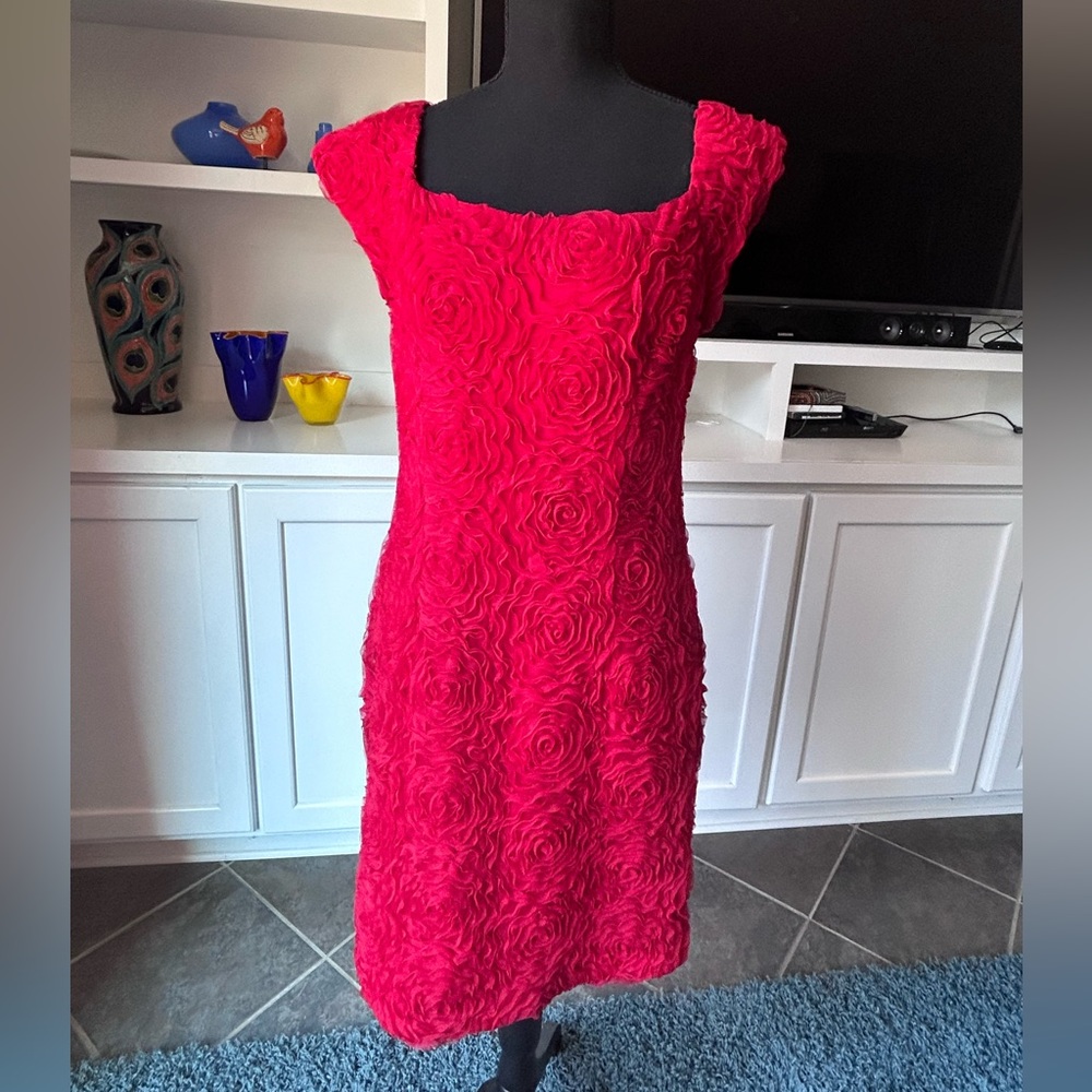 Comfortable, classic red dress with roses texture.